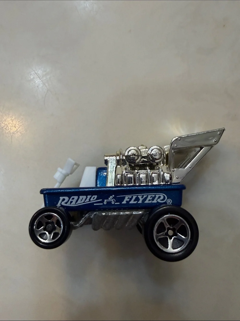 Radio Flyer Blue Kids Toy Car with Chrome Engine Detail